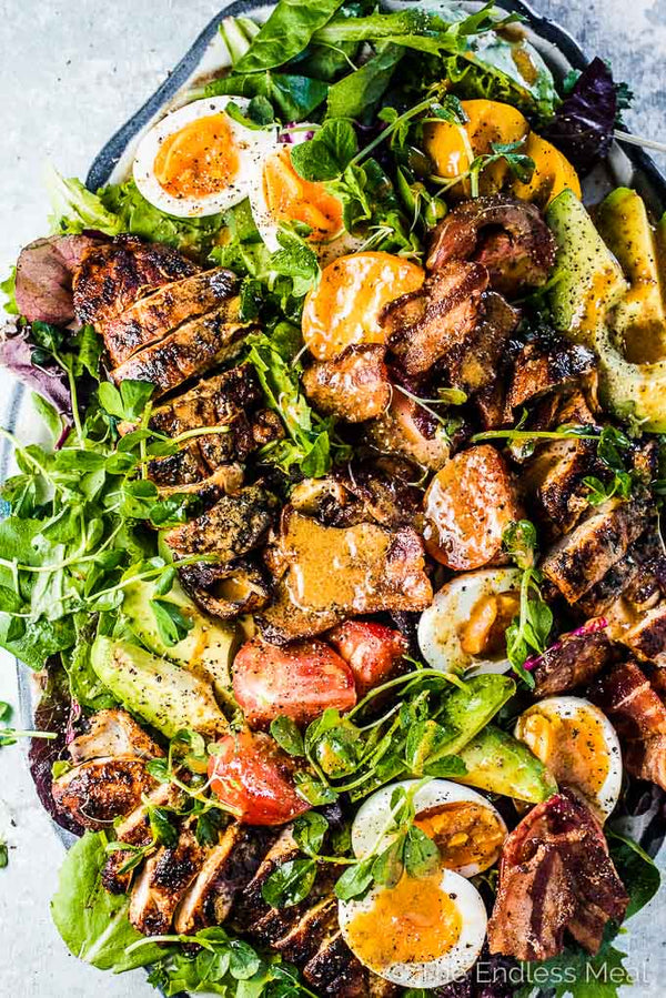 GRILLED CHICKEN COBB SALAD WITH WARM BACON VINAIGRETTE